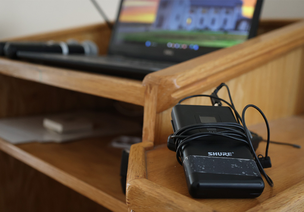 Lapel microphone and two stick microphones available to use.